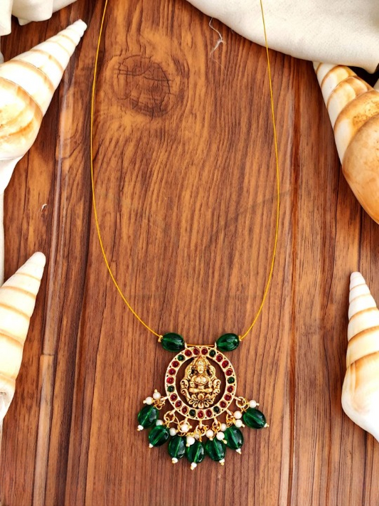 Beautiful Full Stone High Gold Design Party Wear Green Ruby Pendant Set