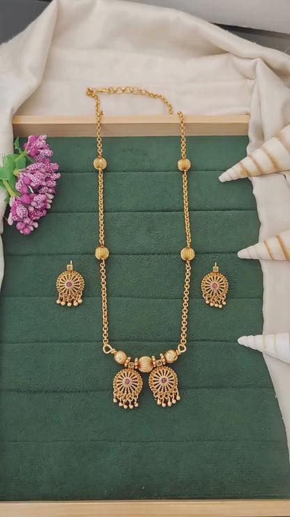 Antique High Gold Polish Designer Party Wear Ruby Green Pendant Set